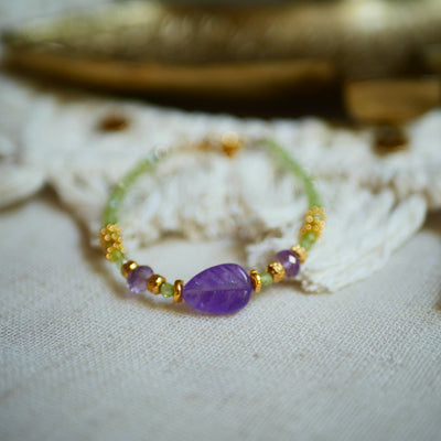 GINANDGER - SUPARNA-PERIDOT- UND AMETHYST-ARMBAND in Dianas Klosterlaedchen